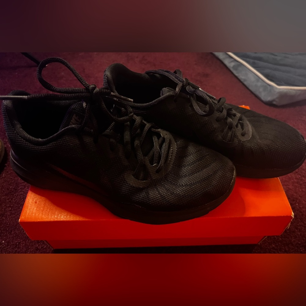 All Black NIKE shoes